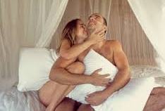 couple making love on bed